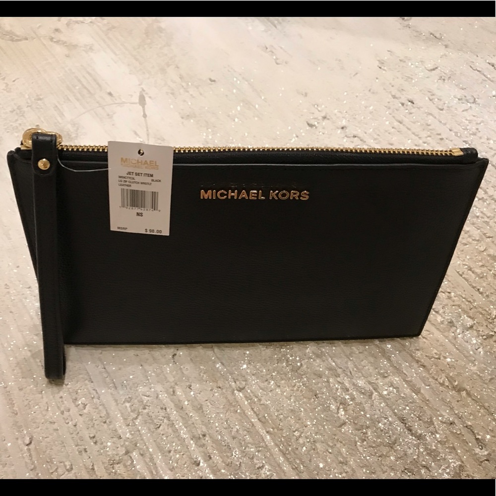 MICHAEL KORS leather pouch .